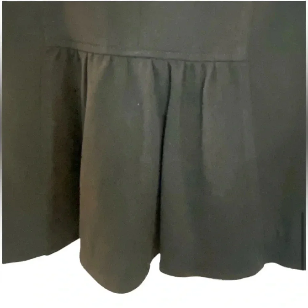 Bebe Women's Black Pencil Skirt Ruffle Detail in the Back Size 10